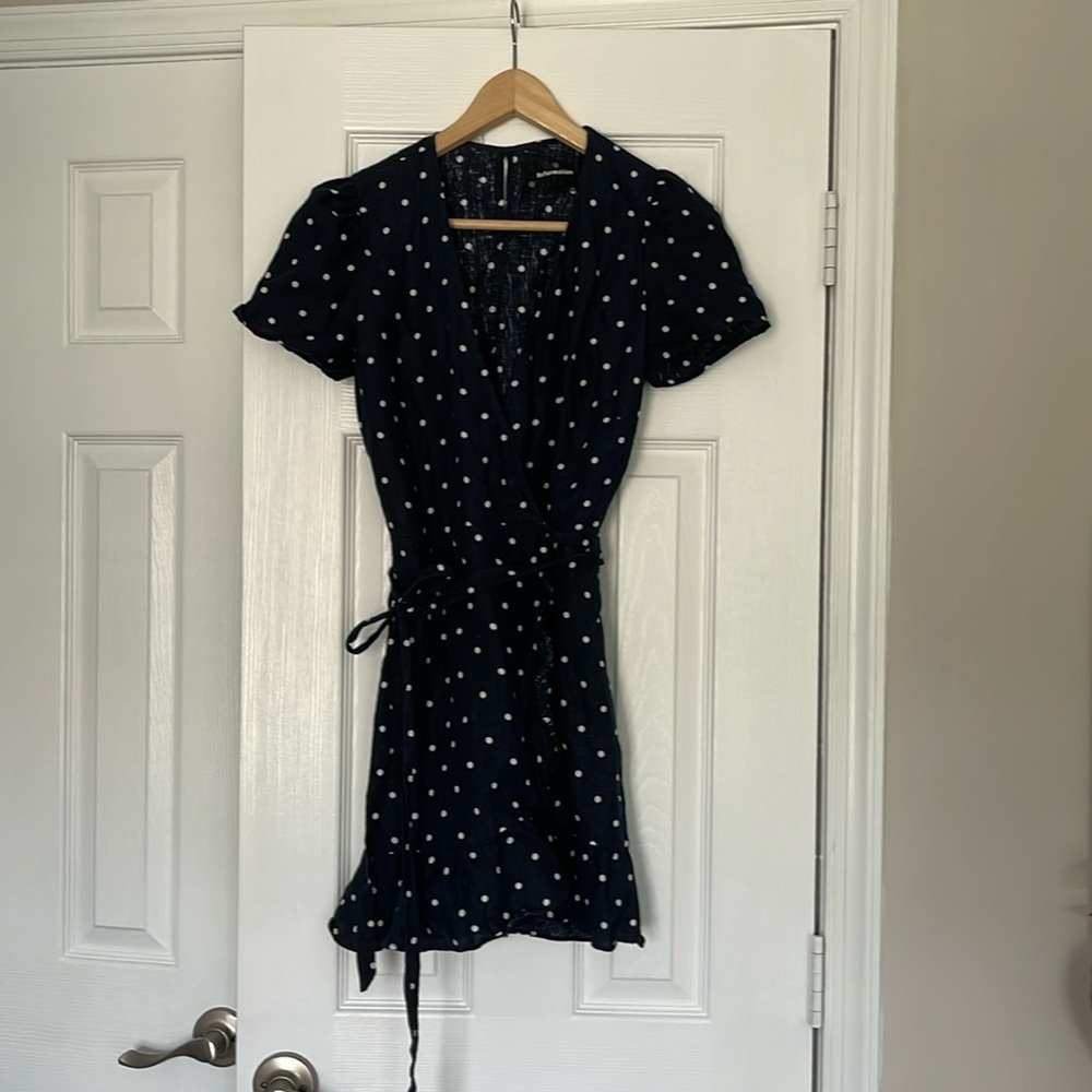 Gorgeous Reformation wrap dress with white polka dots on navy